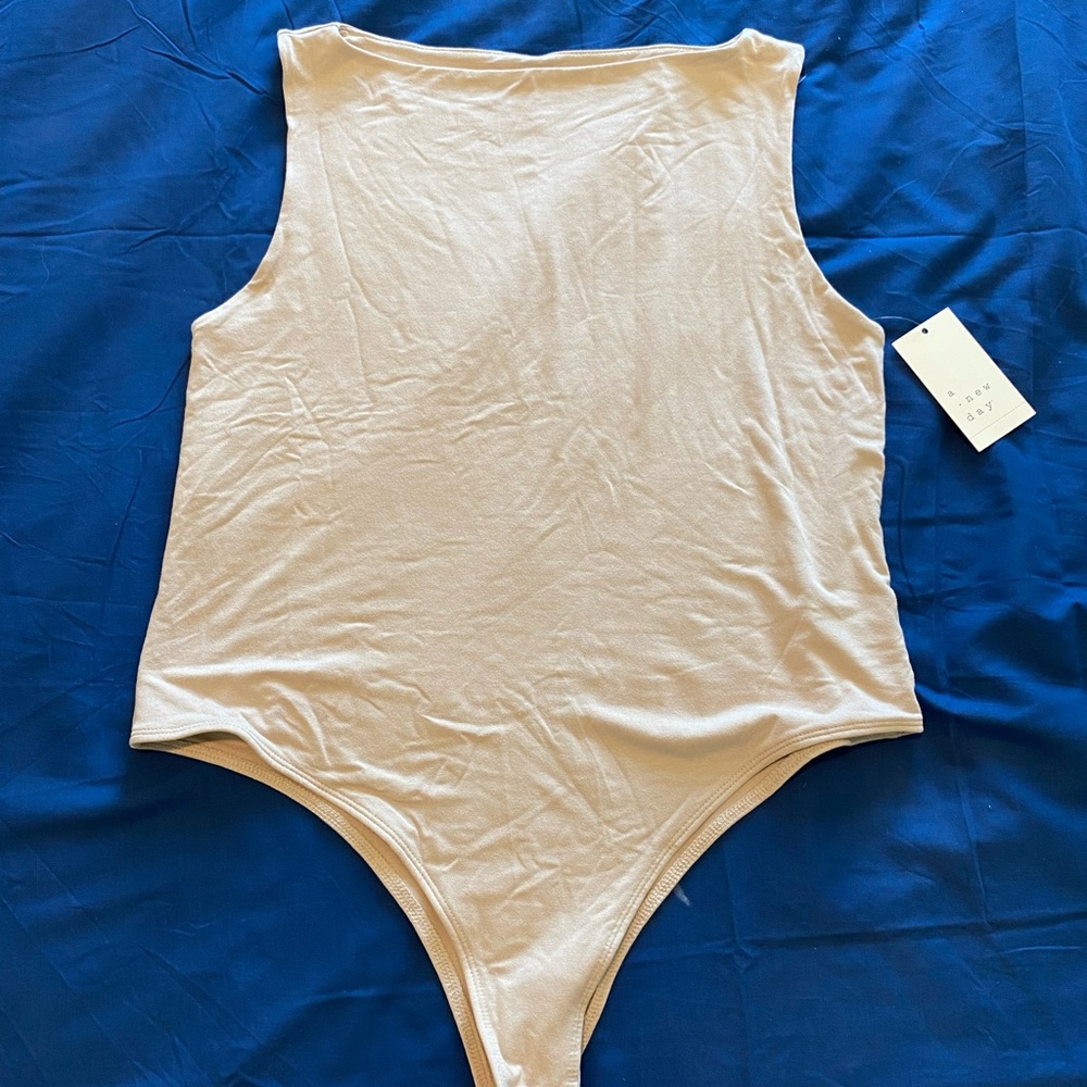 a new day woman’s compression bodysuit. Taupe. NWT L